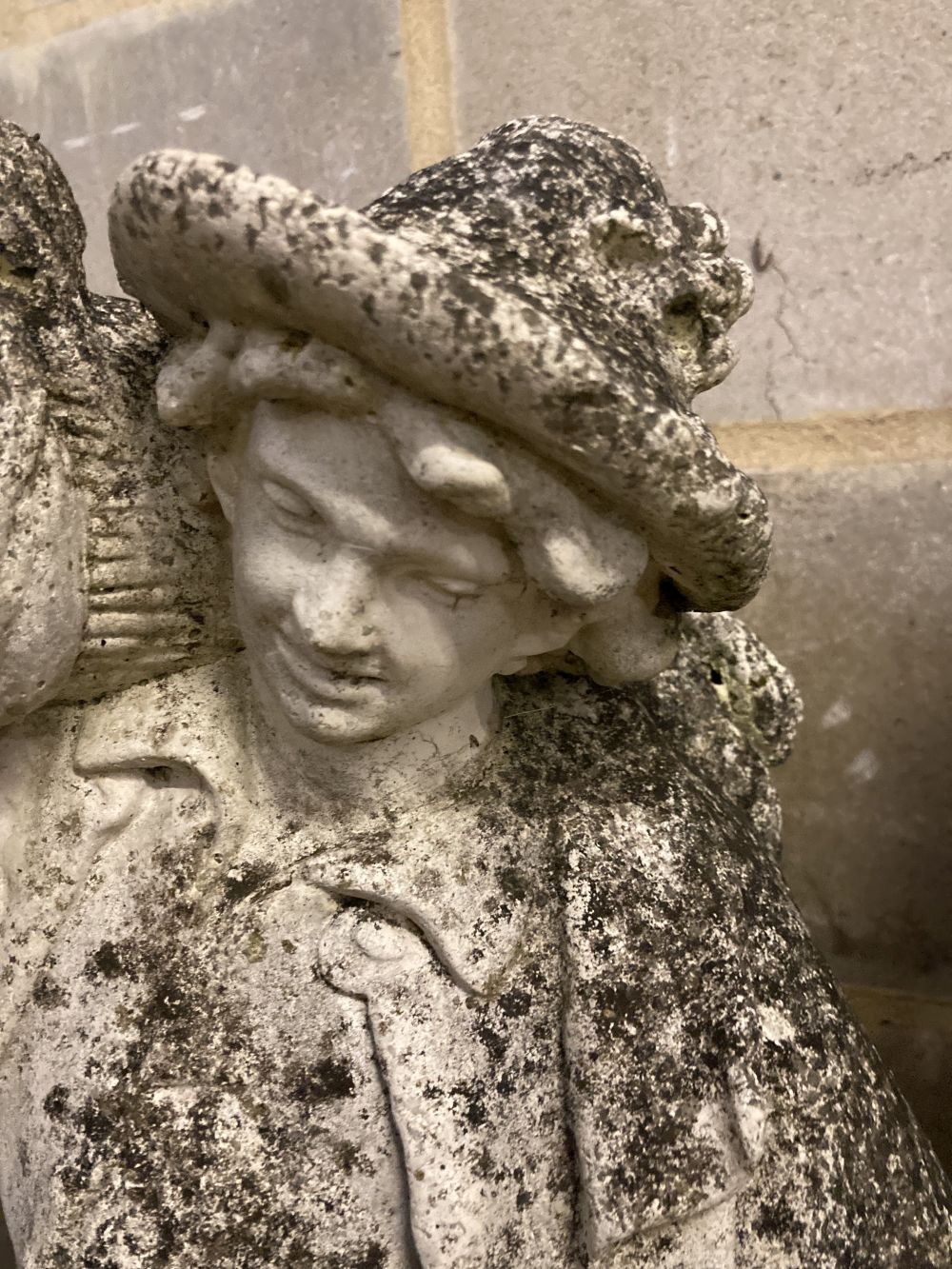 Three reconstituted stone garden ornaments, largest 83cm high